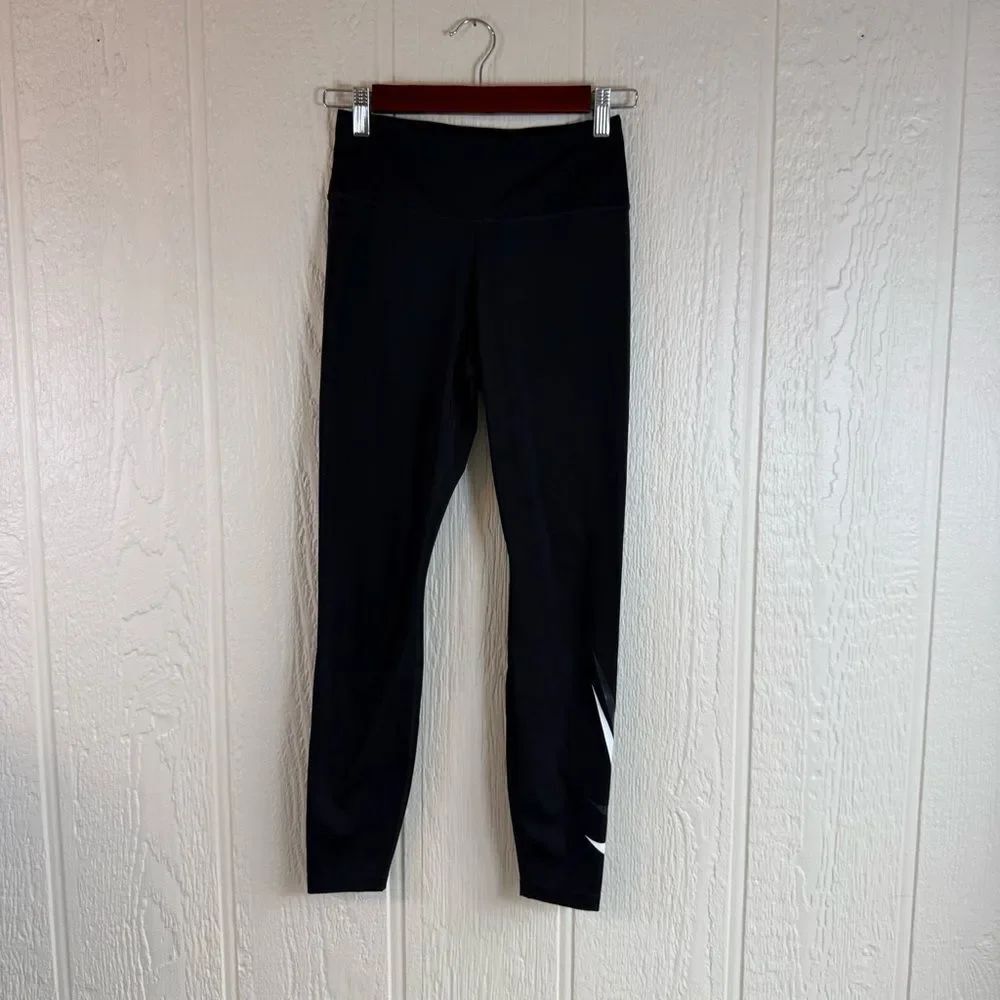 Nike Dri Fit Black Leggings with White Swoosh Accent